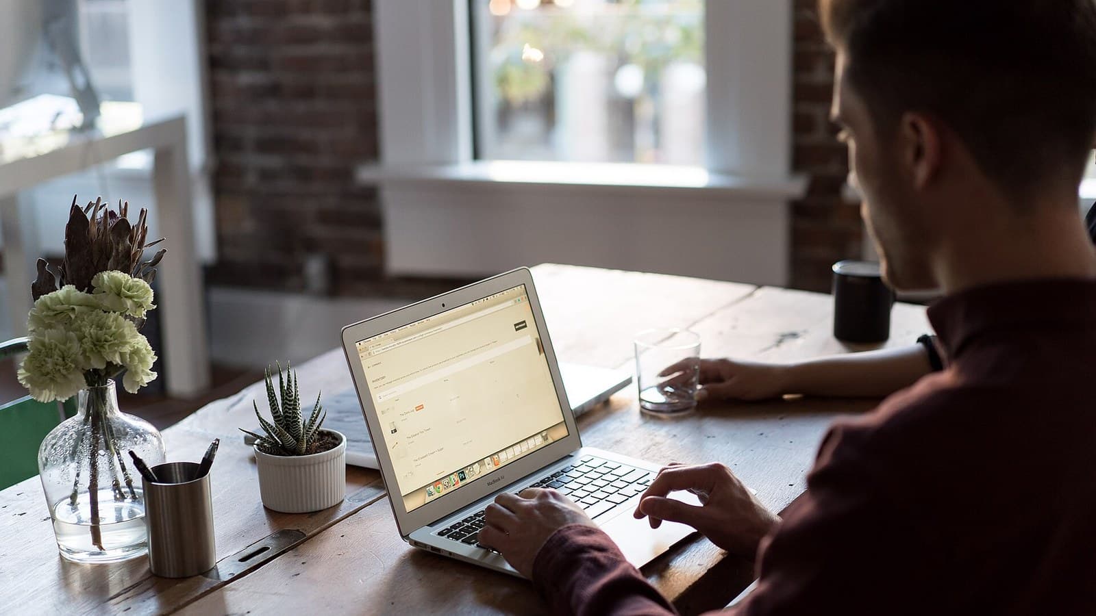 Customer Success and RevOps professional analyzing customer account activity before a difficult renewal conversation
