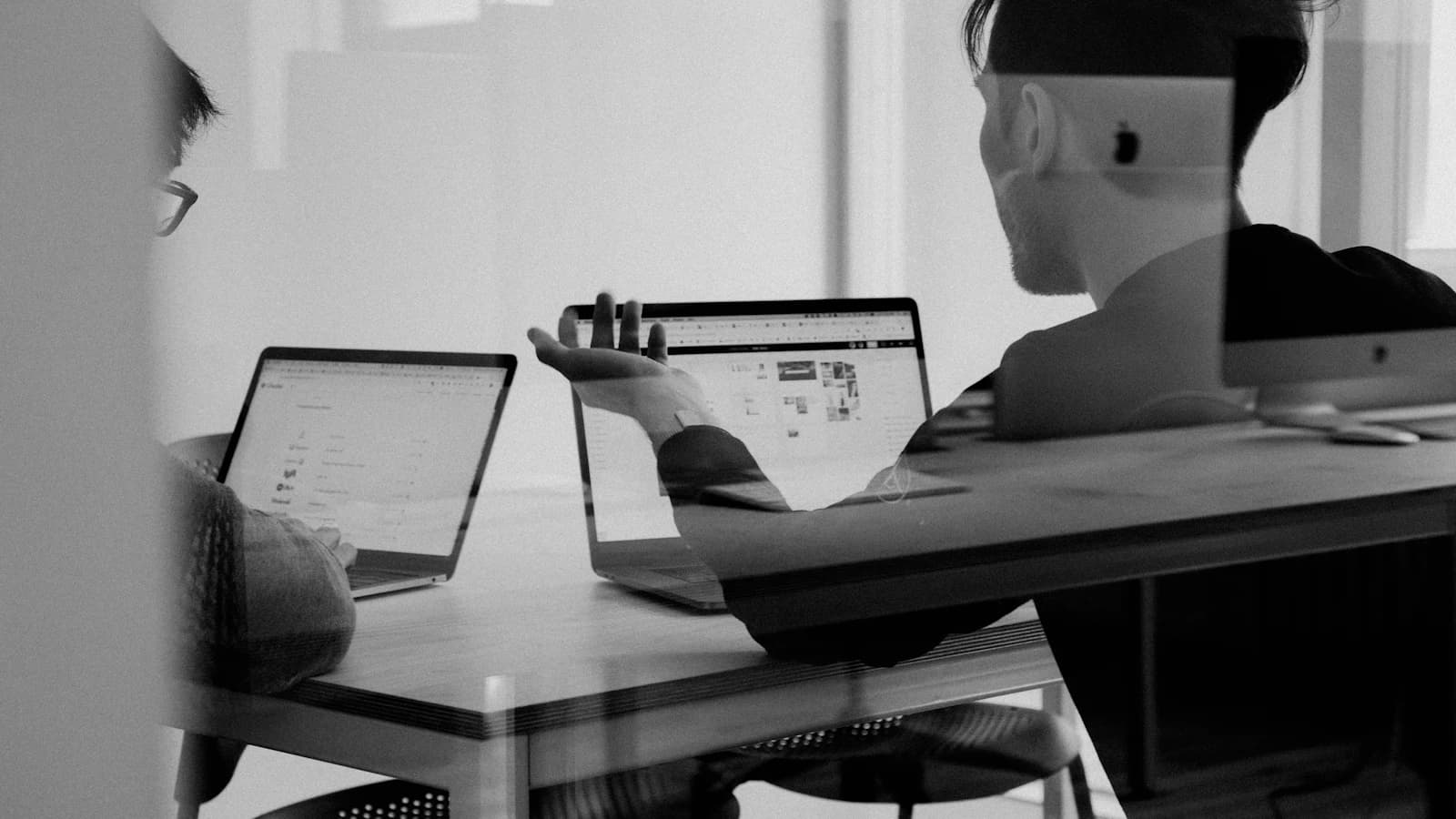 Customer support team reviewing connected knowledge sources with the official Zendesk logo overlay
