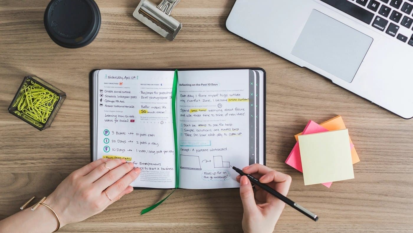 Revenue operations professional checking renewal notes and CRM fields before assigning follow-up
